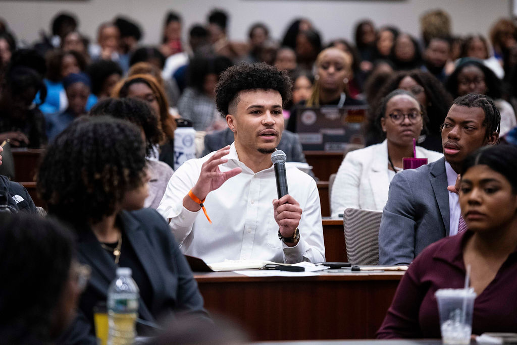 Student asking a question at NBPLC